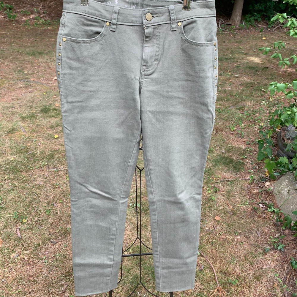 Jennifer Lopez jeans with gold accents